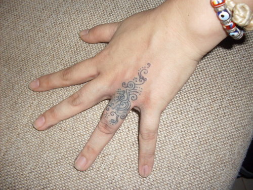 Aimee Marcos Ring Tattoo
